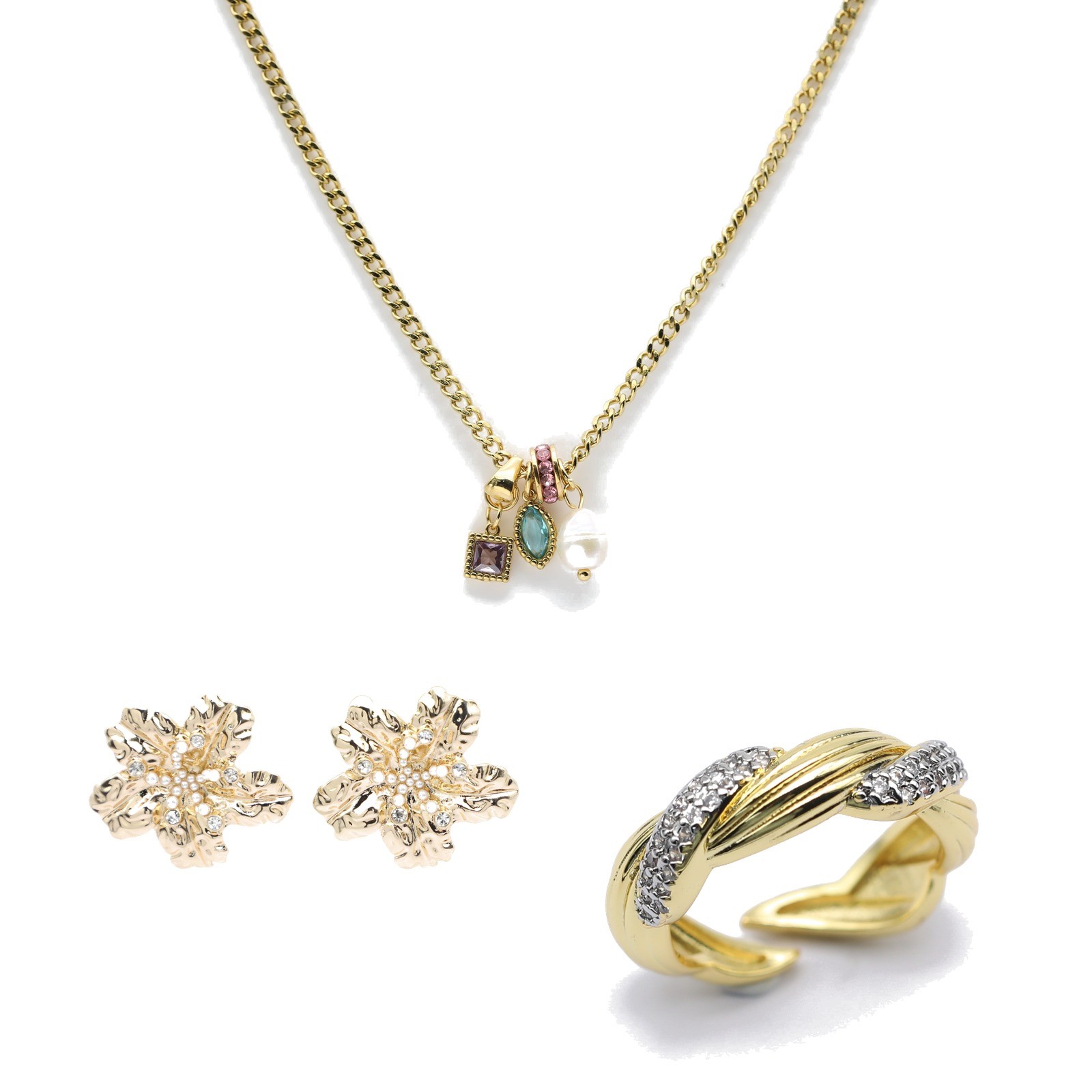 Gold and silver rings on a white surface
