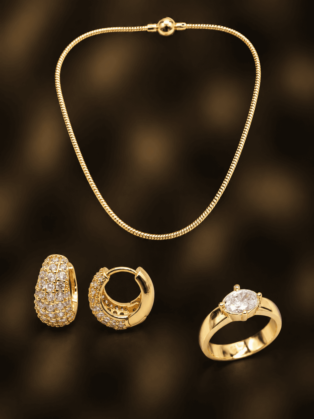 Gold ring on rich black textile