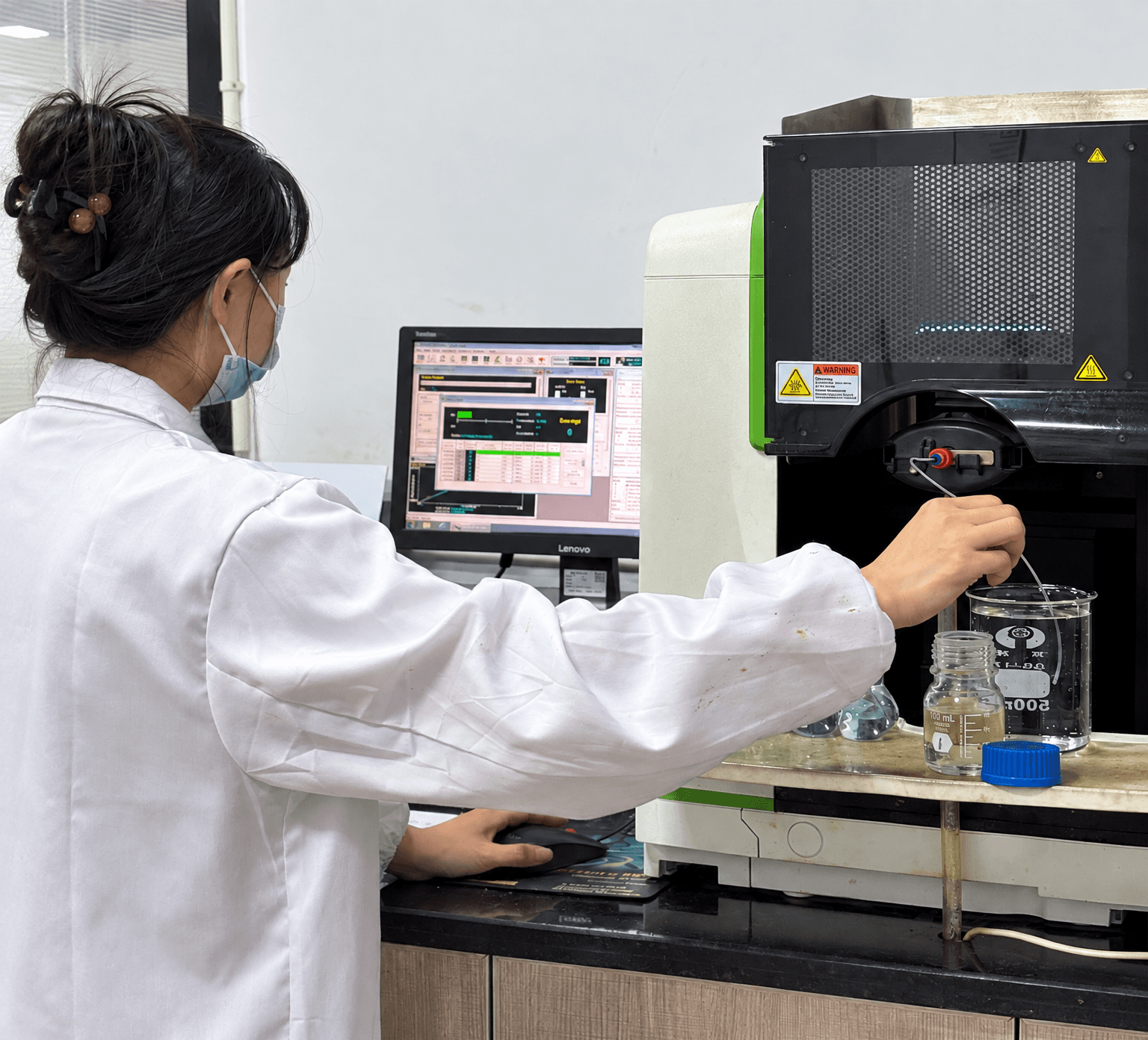 Laboratory professional conducting quality testing with microscope equipment